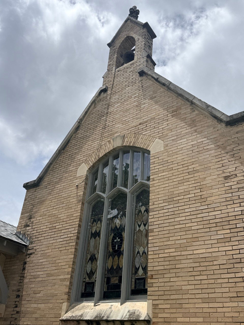 Chapel stained glass window view after restoration.